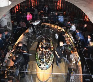 Looking down onto the bar in Layla through mirrors. © starpress