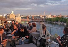 Sundowner in the Gallery Rooftop Bar with birds eye view of the East Side Gallery and uprising Mediaspree plus pitiful lieder by Benne and band